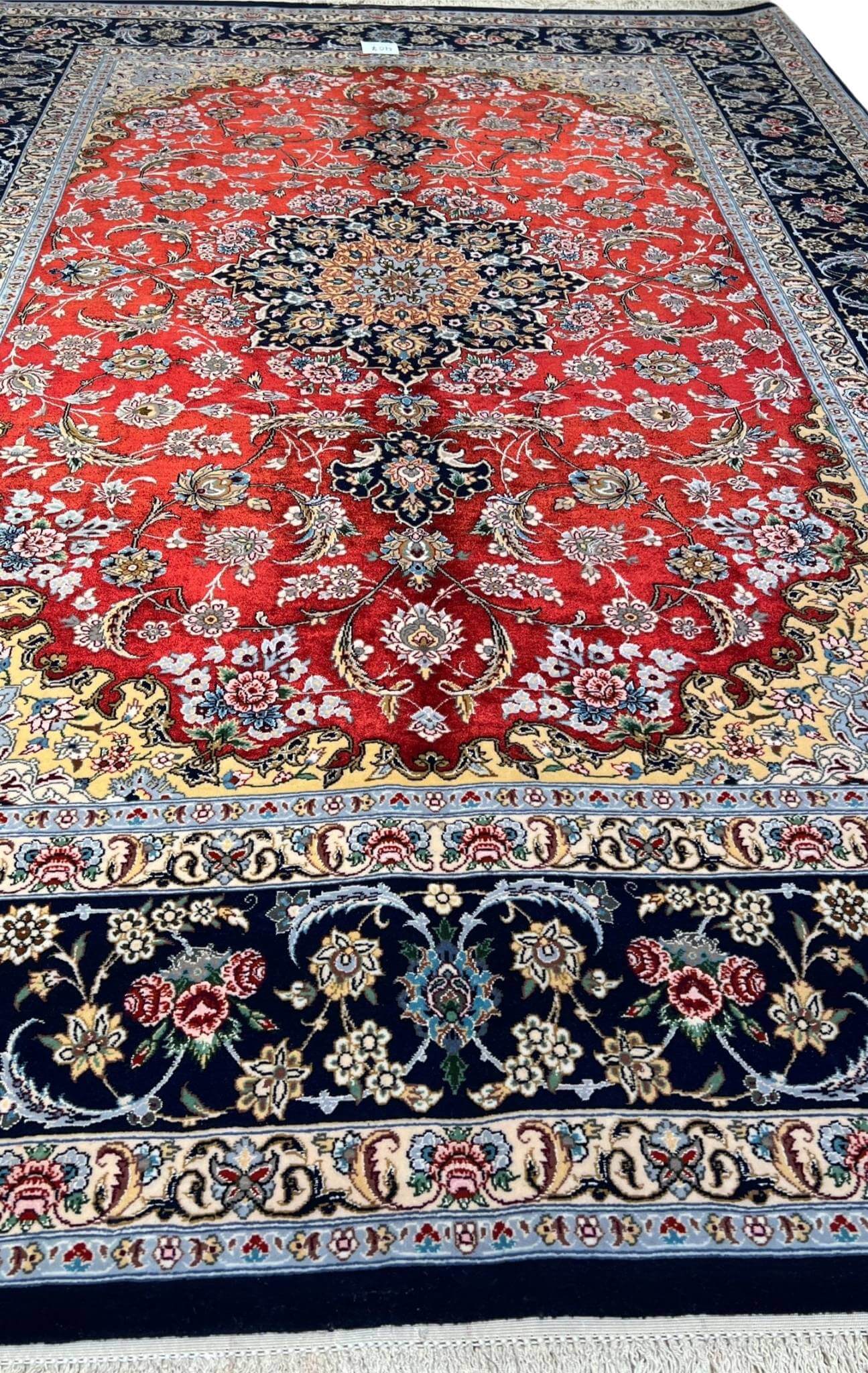 Close-up of the intricate medallion design on Persian rug by Jafar Fakhforie